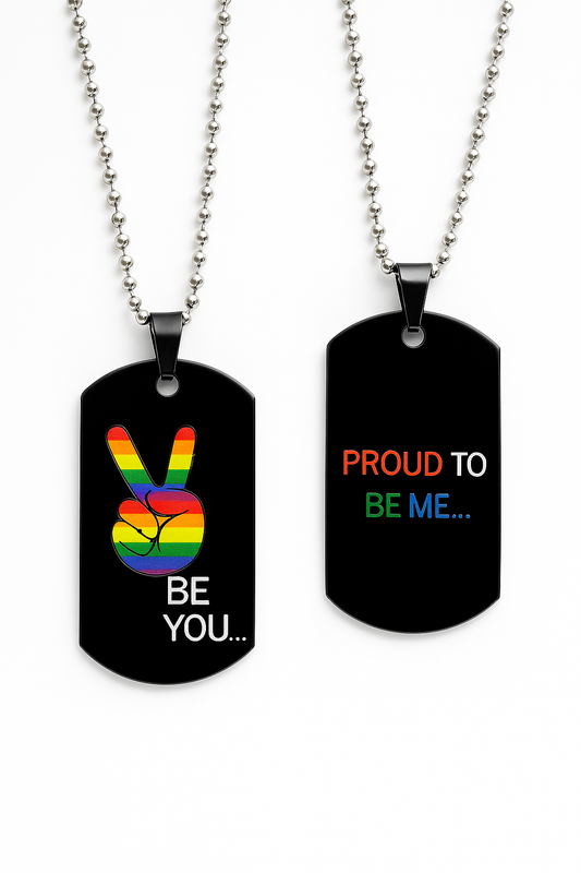 Model wearing Proud To Be Me dog tag necklace layered over streetwear jacket in urban NYC setting